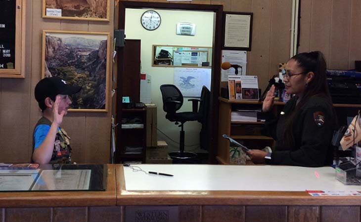 Bryan from Arizona Connections Academy giving a Boy Scout salute. 
